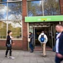 People walk near the Job Centre in Westminster.