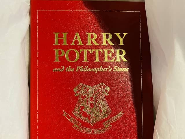 The leather-bound special 15th  anniversary edition of Harry Potter and the Philosophers Stone -  published exclusively for the competition in 2012.