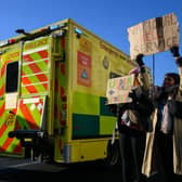 A group of fraudsters have been posing as ambulance staff and knocking on doors asking for financial support ahead of upcoming industrial action.