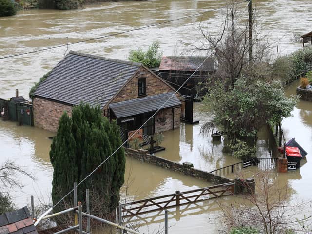 Houses in Ironbridge surrounded by flood waters as River Severn levels started to rise following heavy rain.