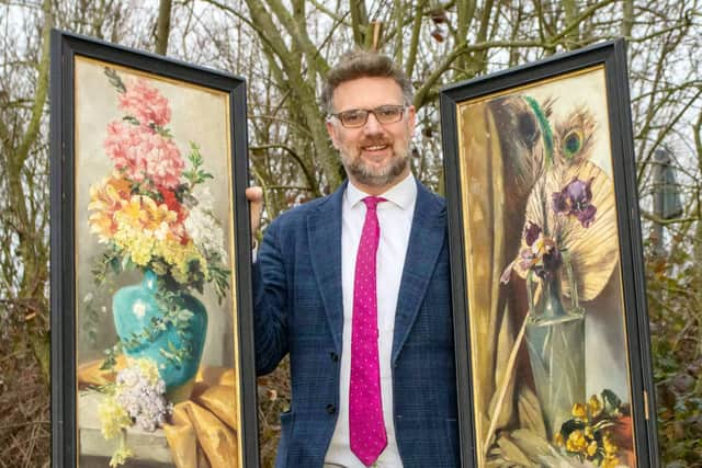 Charles Hanson, owner of Hansons Auctioners, with Queen Victoria’s paintings.  