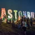 Festival-goers enjoy the atmosphere prior to the 2013 Glastonbury Festival at Worthy Farm. (Photo by Ian Gavan/Getty Images)