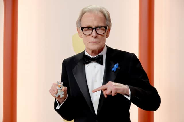 Bill Nighy and his rabbit companion at the 2023 Academy Awards.