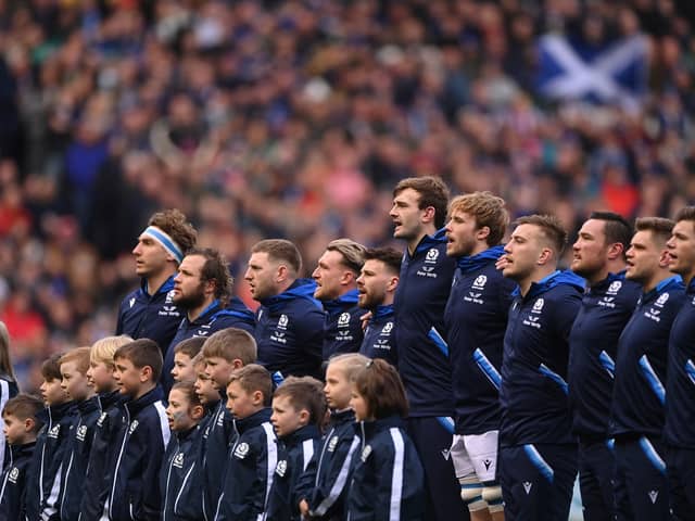 The Scotland team sing the national anthem during a Six Nations Rugby match at Murrayfield Stadium