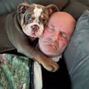 Ain’t nothing but a hound, Doc: David Lindsay with his British Bulldog puppy, Harley. 