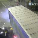The car is seen smashing into the lorry.