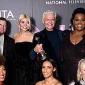 OCTOBER 13:  The team from 'This Morning' including Holly Willoughby, Phillip Schofield and Rochelle Humes, with the Best Daytime award for 'This Morning', in the winners' room at the National Television Awards 2022 at OVO Arena Wembley on October 13, 2022 in London, England. (Photo by Gareth Cattermole/Getty Images)