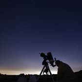 Members of the York Astronomical Society prepare to view the annual Perseids meteor shower in the village of Rufforth, near York, in August 2015 (Photo: OLI SCARFF/AFP via Getty Images)