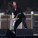 Dave Grohl and the Foo Fighters, performing as The Churnups, play on the Pyramid Stage on day 3 of the Glastonbury festival in the village of Pilton in Somerset, southwest England, on June 23, 2023. The festival takes place from June 21 to June 26. (Photo by Oli SCARFF / AFP) (Photo by OLI SCARFF/AFP via Getty Images)