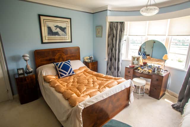 The couple’s 1930s bedroom.