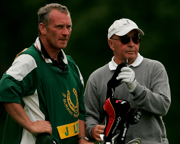 Joe Lewis (right) has been charged with insider trading by a US District Attorney (Credit: Getty)