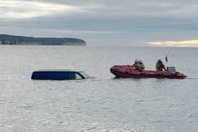 Driver of a van was left red faced after it floated out to sea