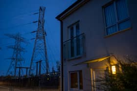 Insulators on an electricity sub station are seen near homes in Manchester.