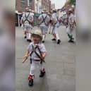 Two-year-old Toby dances along with father’s Morris dance group.