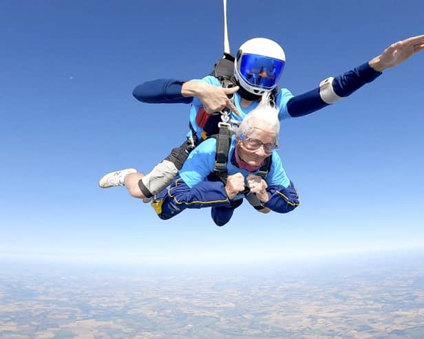 Manette Baillie, from Benhall in Suffolk, does a tandem skydive at the age of 102.