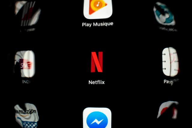 Netflix app. Photo: LIONEL BONAVENTURE/AFP via Getty Images
