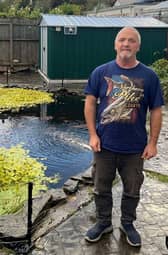 Nigel Cooper and his Koi pond in Ulverston, Cumbria. 
