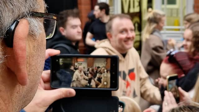 Chris McCausland poses for selfies outside Blackpool Tower during Strictly Come Dancing visit.