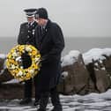 Paying respects at the Gynn Square memorial service to officers who died in the 1983 rescue mission at Blackpool.|Lucinda Herbert, Blackpool Gazette