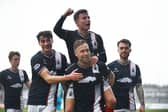 Falkirk star Scott Arfield celebrates with his Barney Stewart, Dylan Tait and Brad Spencer (Photo: Michael Gillen)