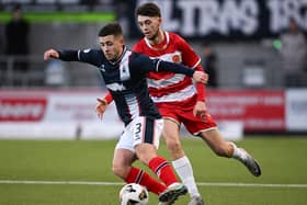 Falkirk's Leon McCann and Hamilton's Steven Bradley in action (Photo: Rob Casey/SNS Group)