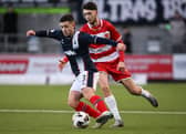 Falkirk's Leon McCann and Hamilton's Steven Bradley in action (Photo: Rob Casey/SNS Group)