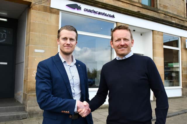 Falkirk’s chief executive officer Jamie Swinney and Henderson outside Crunchy Carrots’ office on Melville Street (Photo: Michael Gillen)