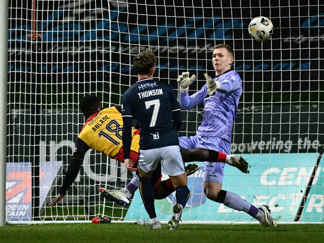 Terry Ablade scores with virtually the last kick of the ball for Partick Thistle against Falkirk