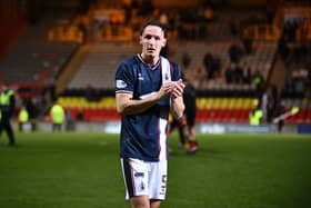 Falkirk ace Liam Henderson applauds the travelling support after the Partick Thistle defeat