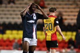 Falkirk winger Alfredo Agyeman reacts after being sent off