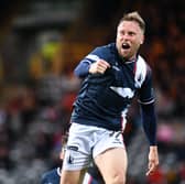 Scott Arfield celebrates scoring for Falkirk against Partick Thistle last time out