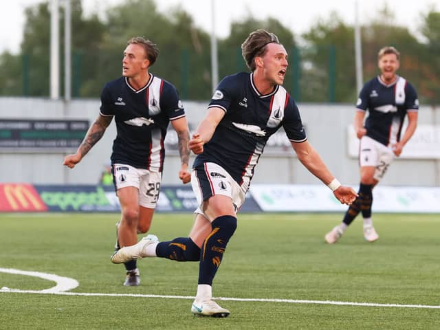 Falkirk winger Ethan Ross wheels away to celebrate after scoring to make it 1-1 against Hamilton Accies