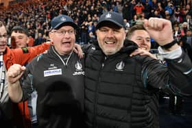 Management team John McGlynn and Paul Smith celebrate