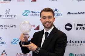 Falkirk midfielder Brad Spencer has been named the Scottish Championship's player of the year by his fellow peers
