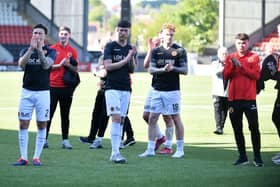 Stenhousemuir's squad applaud the travelling Warriors' support after Saturday's Scottish Championship play-off exit