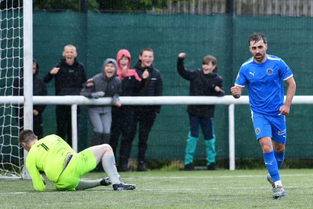 Chris Ogilvie wheels away after scoring for Bo'ness Athletic during Saturday's King Cup final victory