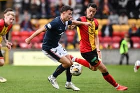 Dylan Tait in action against then-Partick Thistle ace Brian Graham