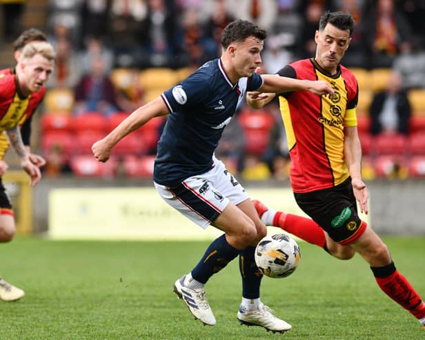 Dylan Tait in action against then-Partick Thistle ace Brian Graham