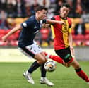 Dylan Tait in action against then-Partick Thistle ace Brian Graham