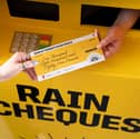 These rain cheques may include £1,885 in cash