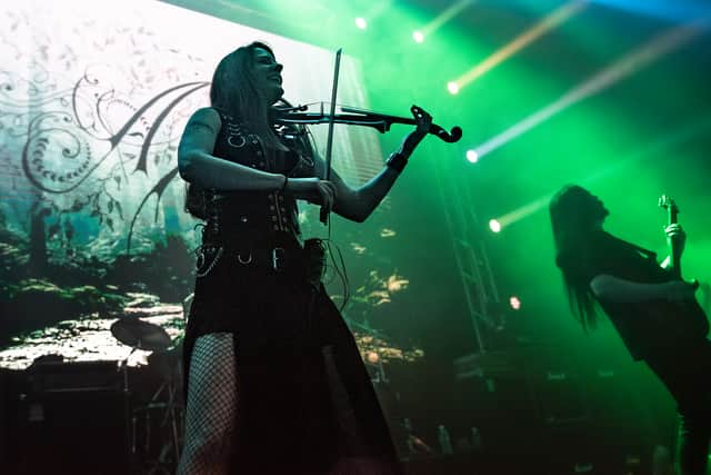Violinist Hayley Anderson plays with Aquilius, a dark classical metal band from Australia at Fortress Festival.