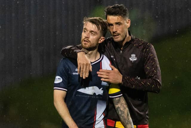 Brad Spencer is consoled by then-Thistle player/interim co-boss Brian Graham after his side beat the Bairns 2-1 at Firhill last season on the penultimate matchday