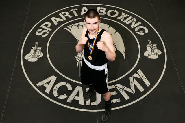 Sparta Boxing Academy star Dima Cojocar shows off his Moldovan gold medal