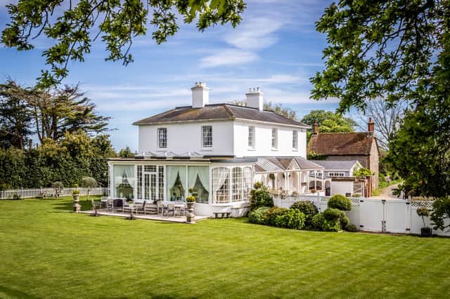 The £3 million house sits in 1.34 acres of private, manicured gardens