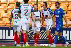 Falkirk ace Scott Arfield celebrates scoring to make it 1-0