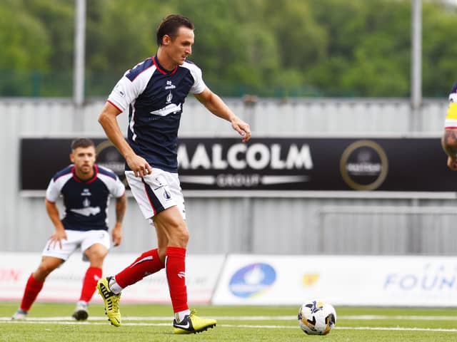 Liam Henderson on the ball for Falkirk
