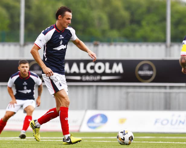 Liam Henderson on the ball for Falkirk