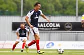 Liam Henderson on the ball for Falkirk