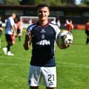 Dylan Tait with the match ball after netting a hat-trick