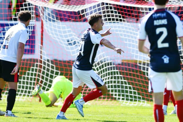 Falkirk midfielder Dylan Tait wheels away to celebrate his hat-trick against Brechin City last Saturday afternoon